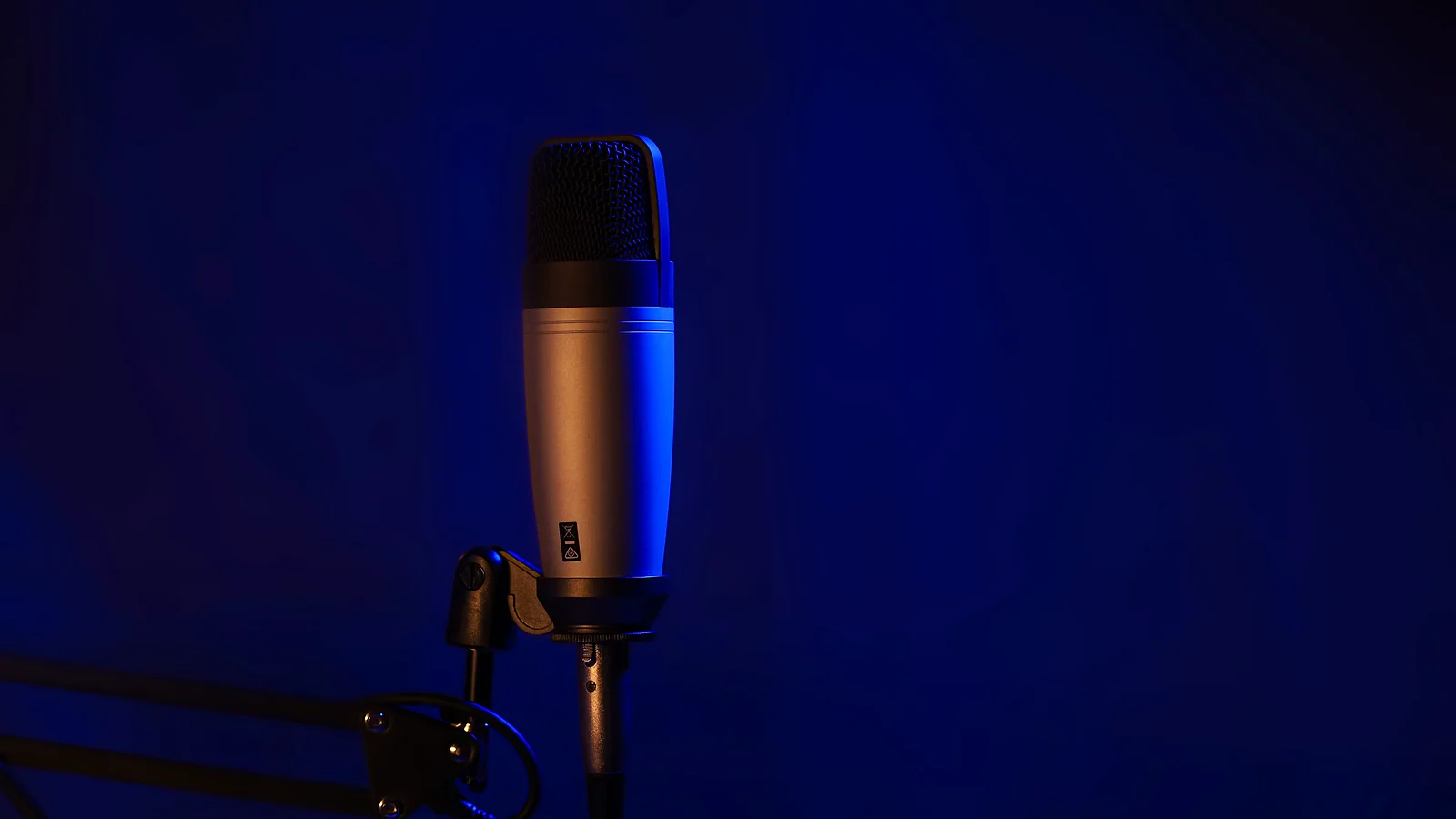 Studio microphone lit for voice recording